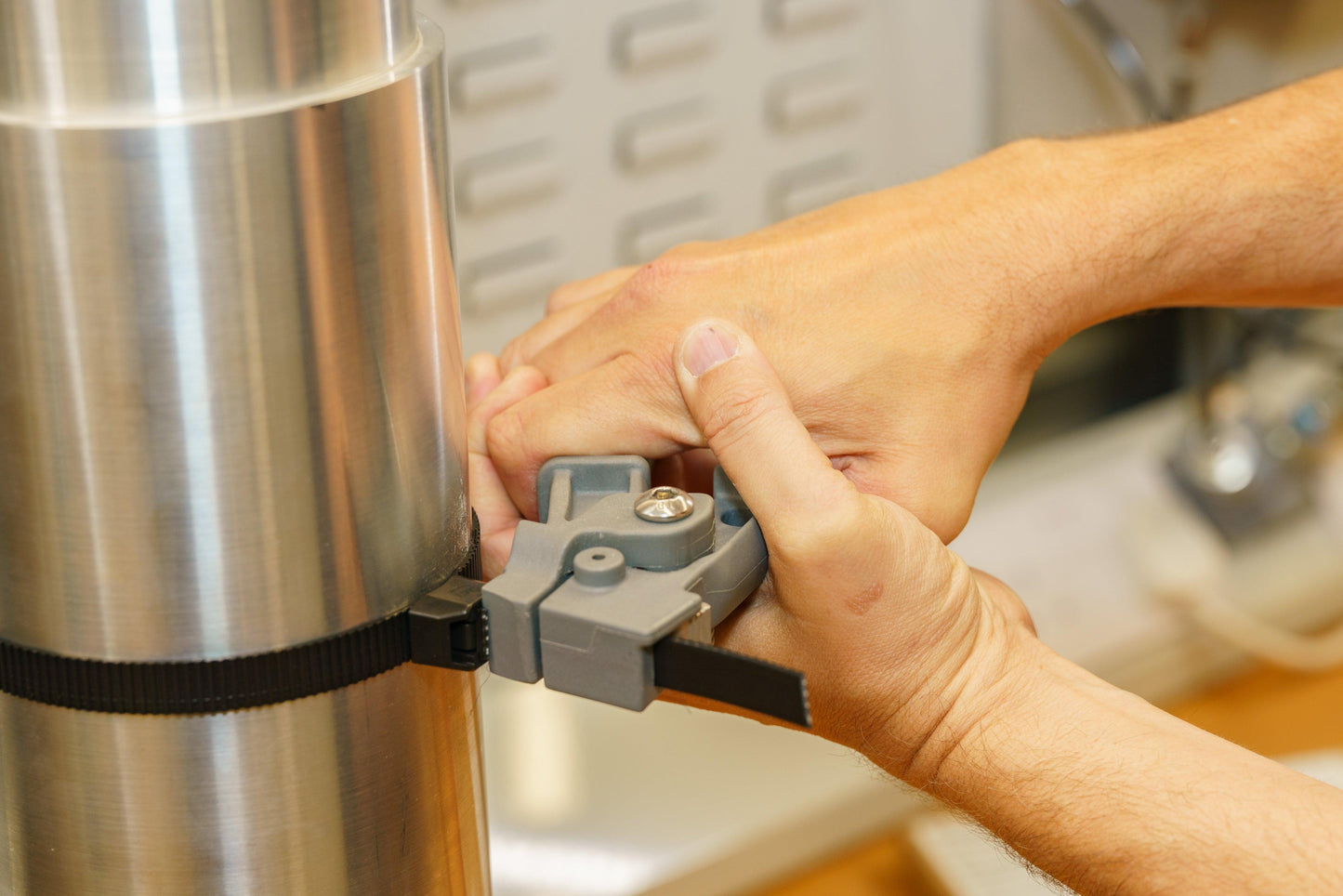 Smart Band Flex tightening tool in action with hands using product