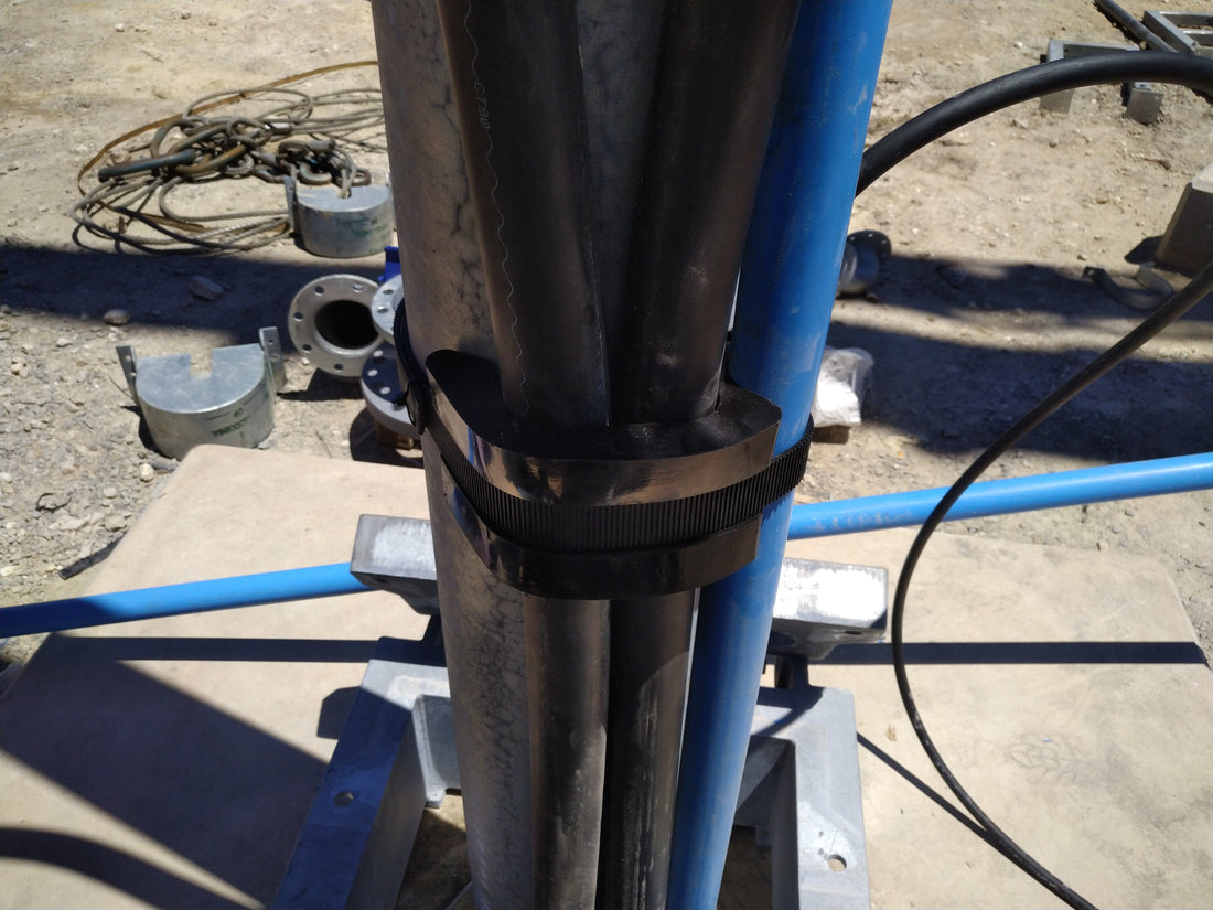Smart Protector PPS cable protector saddle and Smart Band polymer banding for downhole ESP cable and control line security on production tubing